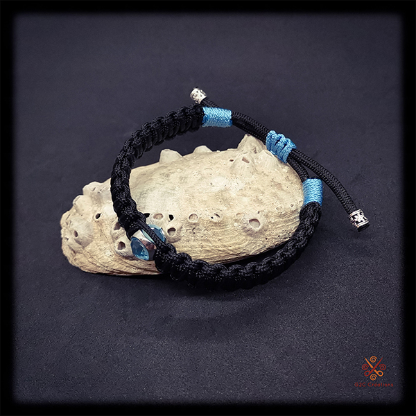 Bracelet en paracorde noir perle bleue